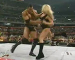 Today in History: Lita & The Rock vs. Trish Stratus & HHH