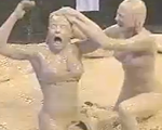 Today in History: Stacy Keibler vs. Trish Stratus in a Mud Match