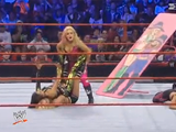 Today in History: Divas of Doom vs. Lay-Cool in a Tag Team Tables Match