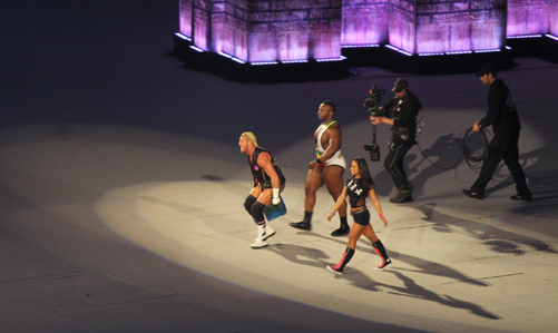 A.J., Dolph Ziggler and Big E. Langston make their way to the ring.