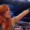 Becky Lynch Pointing at the WrestleMania Sign